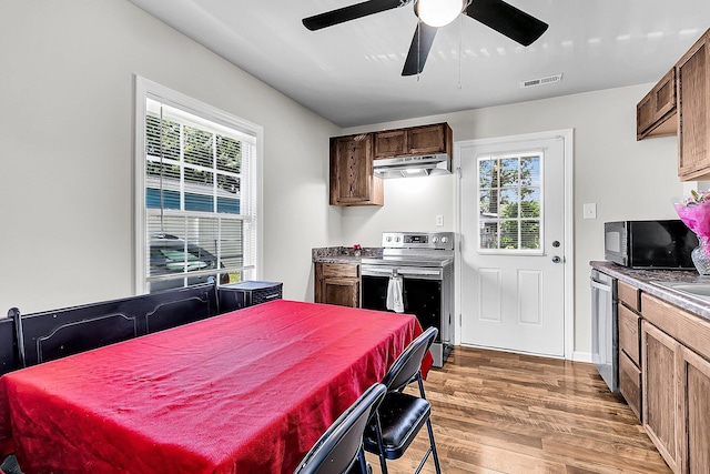 5806 Robinhood Dr, Hanahan, SC 29410 - dining room with light wood-style floors and a ceiling fan