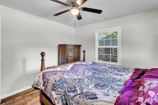 5806 Robinhood Dr, Hanahan, SC 29410 - bedroom with wood finished floors, baseboards, and a ceiling fan