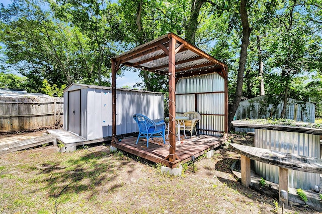 5806 Robinhood Dr, Hanahan, SC 29410 - view of yard with a shed, fence, an outdoor structure, and a deck
