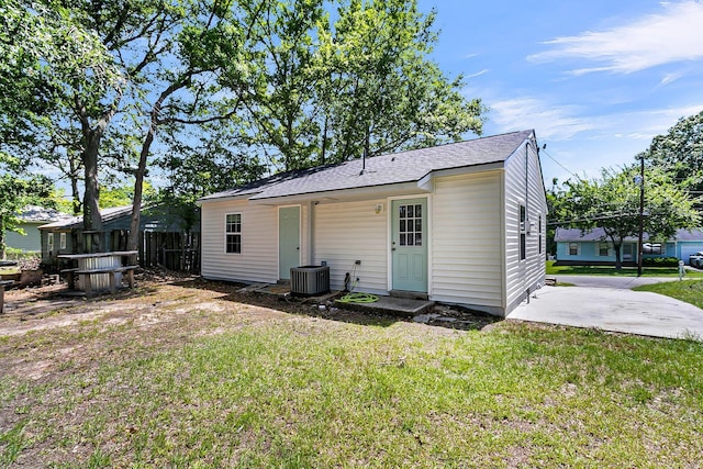 5806 Robinhood Dr, Hanahan, SC 29410 - rear view of house with cooling unit and roof with shingles
