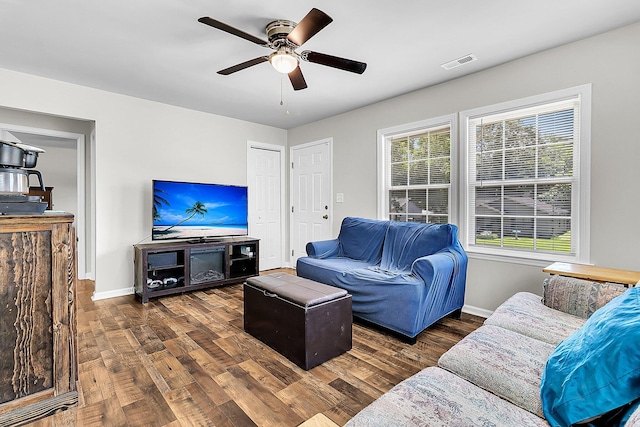 5806 Robinhood Dr, Hanahan, SC 29410 - living area with wood finished floors, ceiling fan, and baseboards