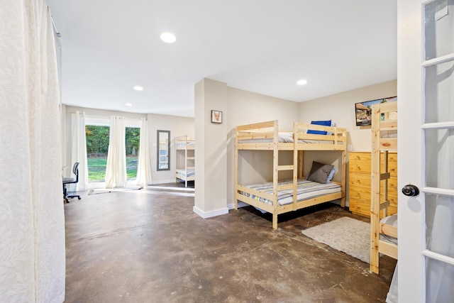 109 Beacon Ave, Moncks Corner, SC 29461 - bedroom featuring concrete floors, recessed lighting, and baseboards