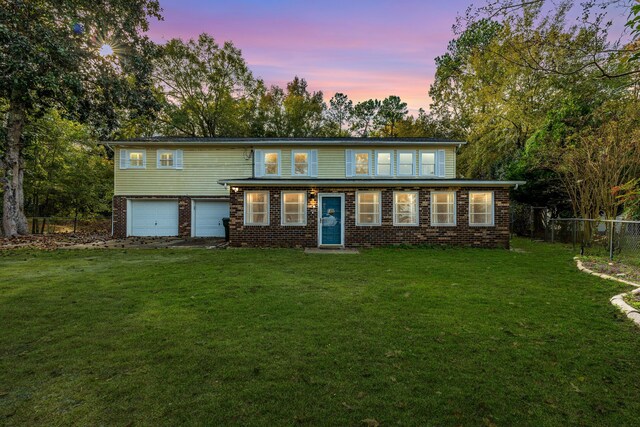 109 Beacon Ave, Moncks Corner, SC 29461 - view of front facade with an attached garage and brick siding