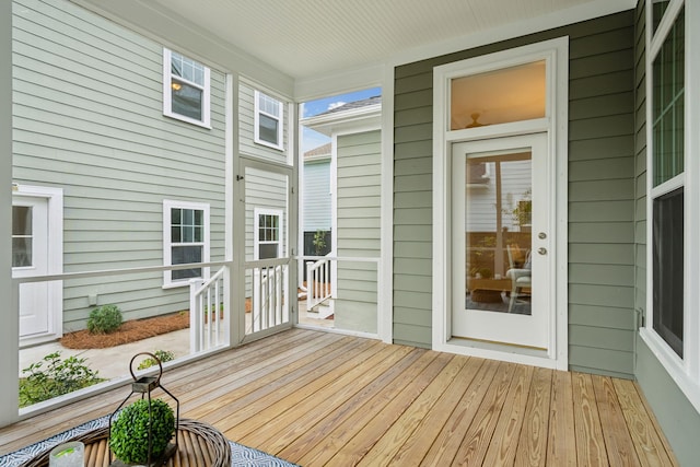 wooden terrace with a porch