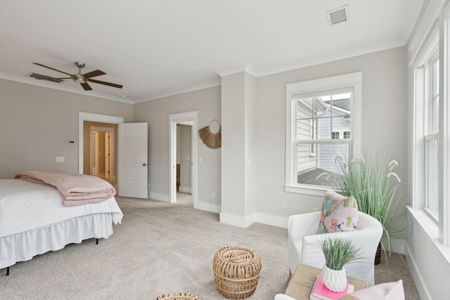 bedroom featuring ceiling fan, ornamental molding, and light carpet