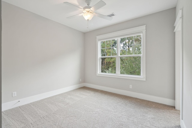 unfurnished room featuring carpet flooring and ceiling fan