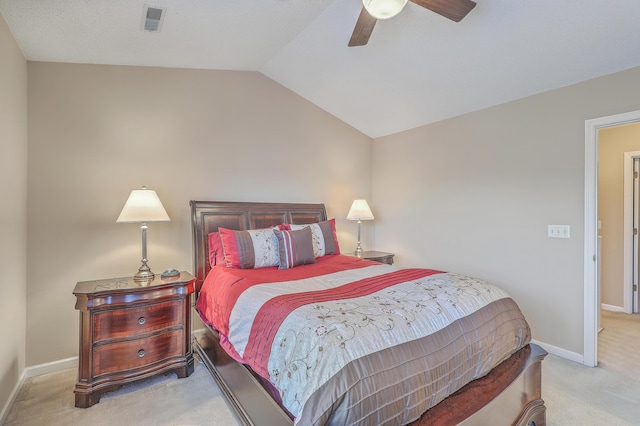 bedroom featuring ceiling fan, carpet floors, visible vents, baseboards, and vaulted ceiling