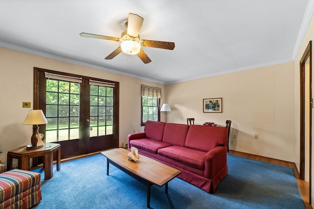 living room featuring french doors, crown molding, and ceiling fan