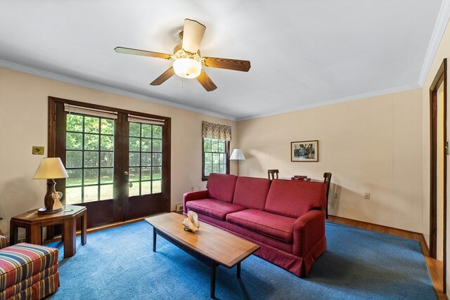 2266 Griffith Dr, Orangeburg, SC 29118 - living room featuring french doors, ornamental molding, a ceiling fan, and baseboard heating