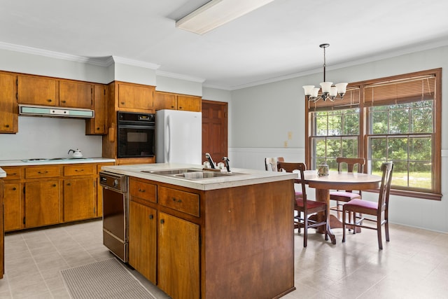 2266 Griffith Dr, Orangeburg, SC 29118 - kitchen with light countertops, an inviting chandelier, a sink, and black appliances