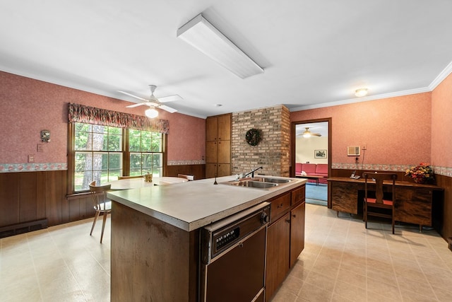 kitchen featuring an island with sink, sink, dark brown cabinets, dishwasher, and crown molding