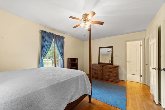 bedroom with light wood-type flooring and ceiling fan