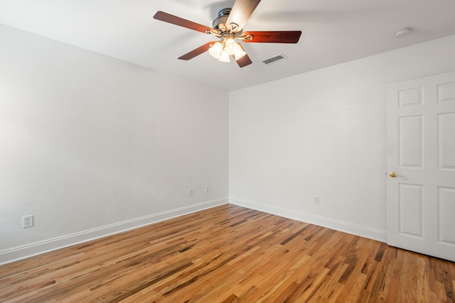 unfurnished room featuring ceiling fan and light hardwood / wood-style flooring