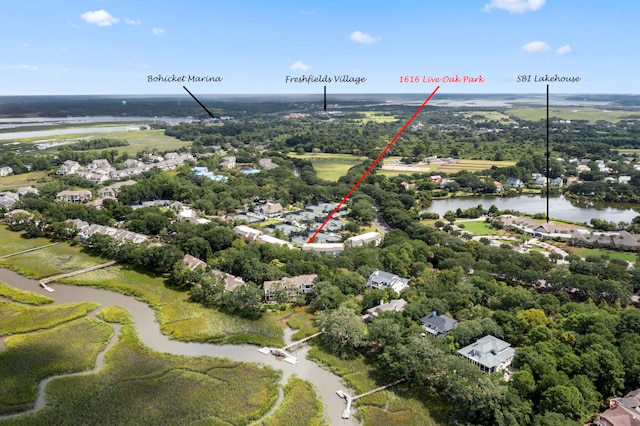 birds eye view of property featuring a water view