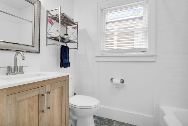 full bath featuring toilet and vanity
