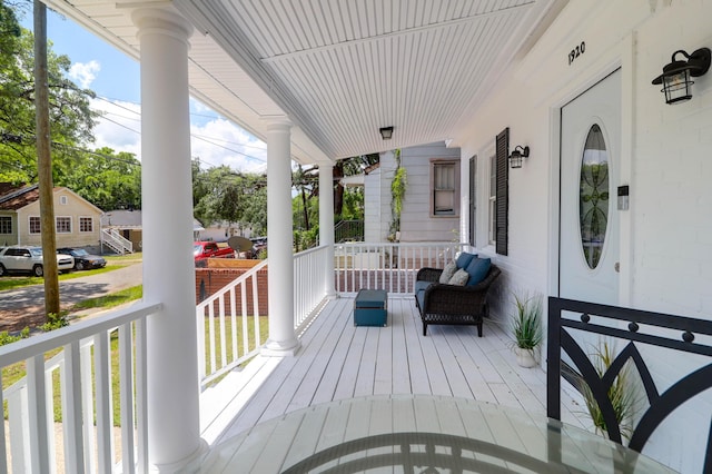 wooden deck featuring a porch