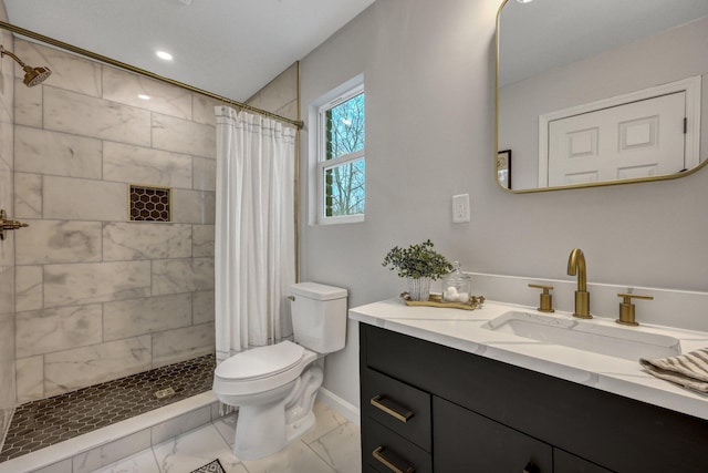 full bathroom with marble finish floor, toilet, a tile shower, vanity, and baseboards