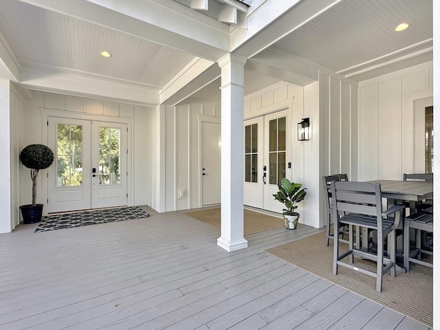 wooden deck with french doors