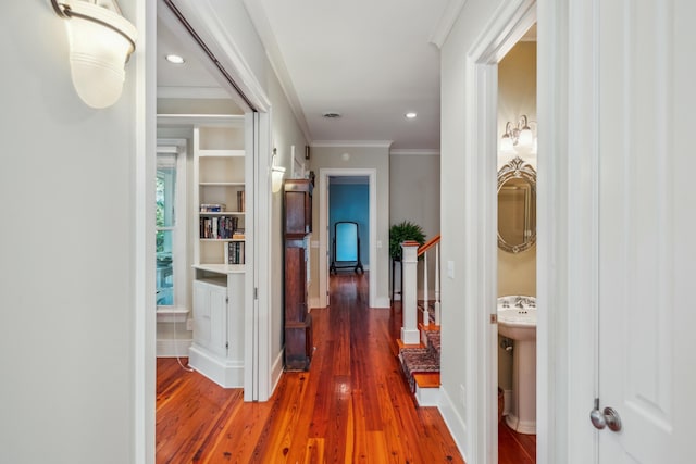 707 Royall Ave, Mount Pleasant, SC 29464 - hall featuring crown molding, wood finished floors, and baseboards
