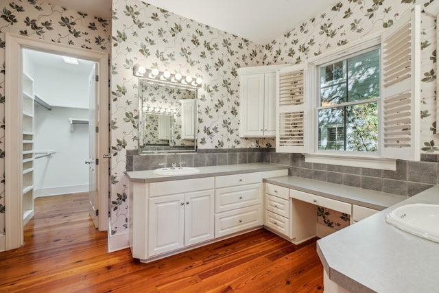 707 Royall Ave, Mount Pleasant, SC 29464 - bathroom featuring vanity, wallpapered walls, and wood finished floors