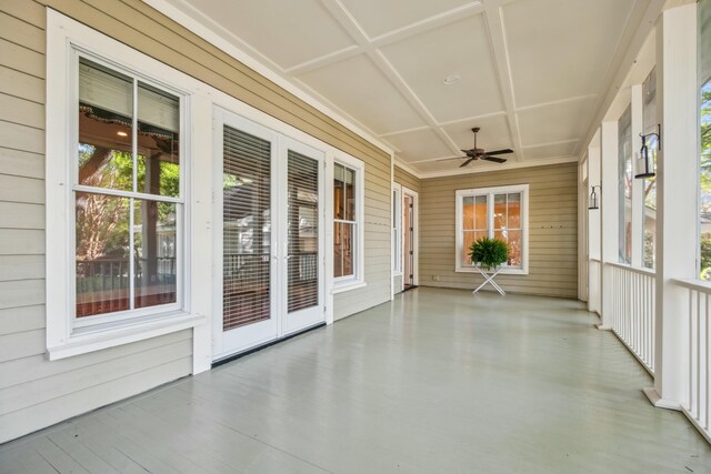 707 Royall Ave, Mount Pleasant, SC 29464 - unfurnished sunroom with coffered ceiling, a ceiling fan, and french doors