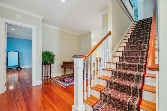707 Royall Ave, Mount Pleasant, SC 29464 - stairs with baseboards, recessed lighting, crown molding, and wood finished floors