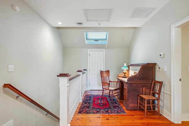 707 Royall Ave, Mount Pleasant, SC 29464 - living area featuring wood finished floors, an upstairs landing, recessed lighting, vaulted ceiling, and visible vents