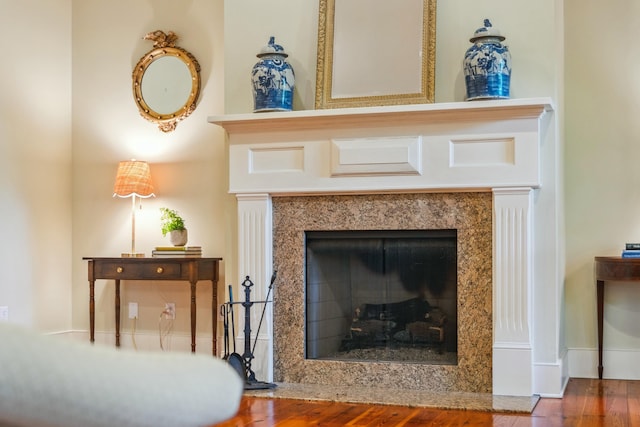 707 Royall Ave, Mount Pleasant, SC 29464 - details featuring a high end fireplace and wood finished floors