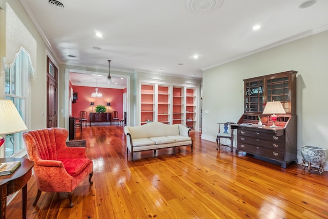 707 Royall Ave, Mount Pleasant, SC 29464 - living room featuring ornamental molding, hardwood / wood-style floors, visible vents, and recessed lighting