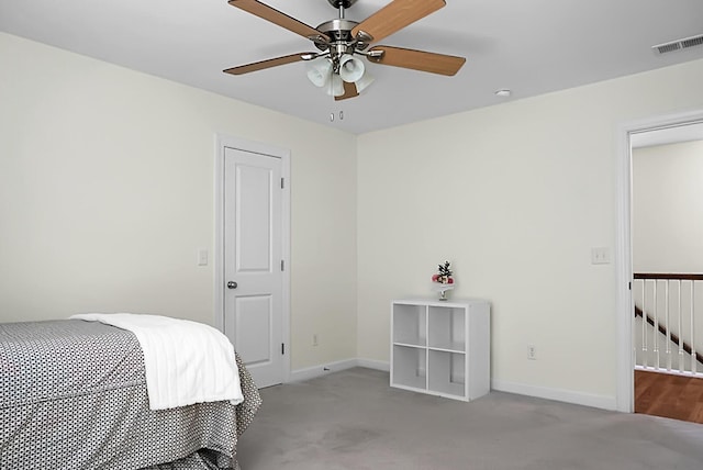 carpeted bedroom featuring ceiling fan