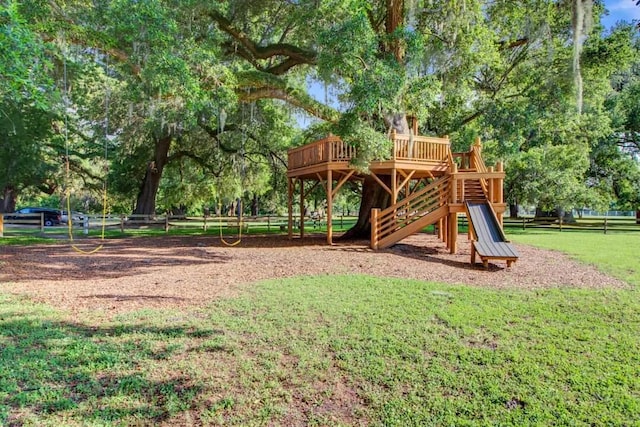 view of play area featuring a lawn