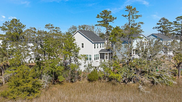 view of side of property with a residential view