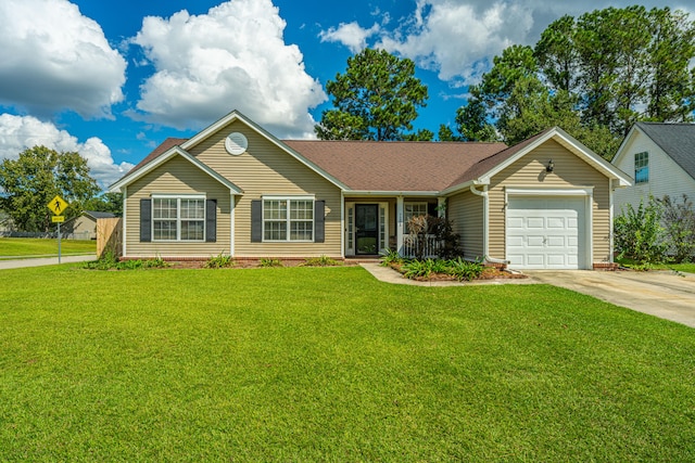 ranch-style house featuring a front lawn and a garage