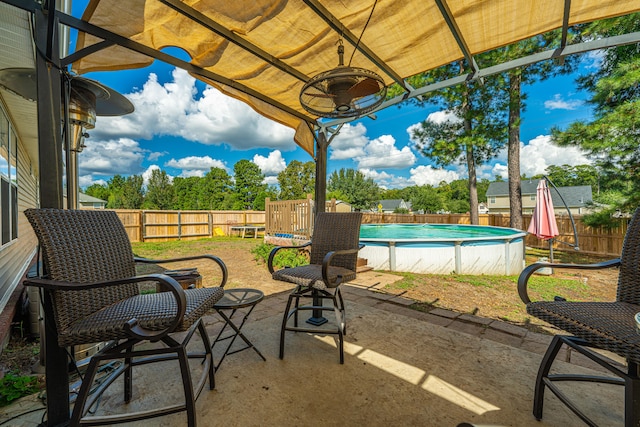 view of patio / terrace featuring a fenced in pool