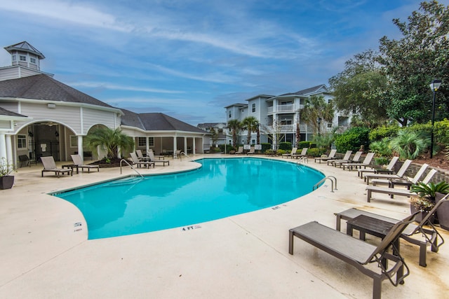 view of pool featuring a patio area