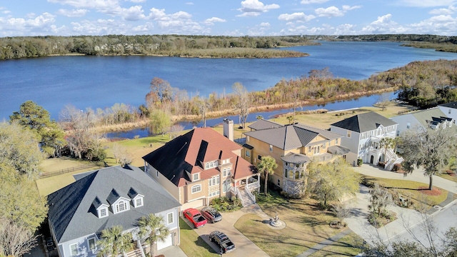 aerial view with a residential view and a water view