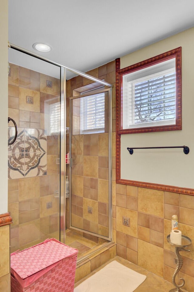 bathroom featuring a shower stall