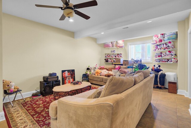 living room featuring tile patterned floors, recessed lighting, a ceiling fan, and baseboards