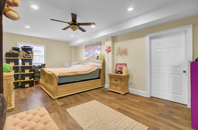 bedroom featuring recessed lighting, baseboards, and wood finished floors