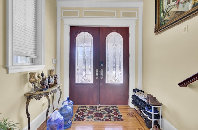 foyer entrance featuring french doors