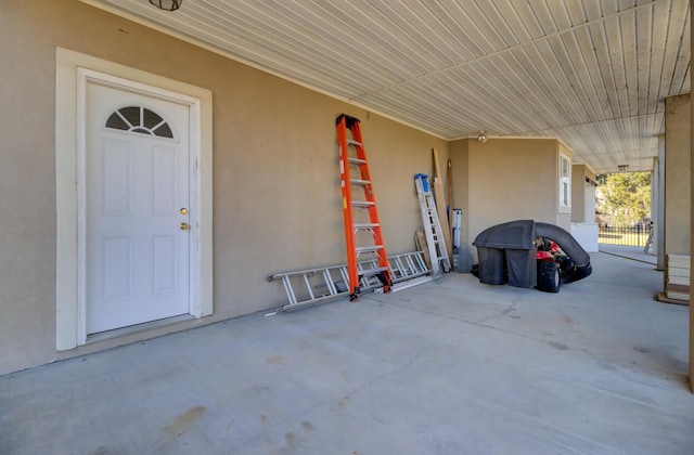 exterior space featuring stucco siding