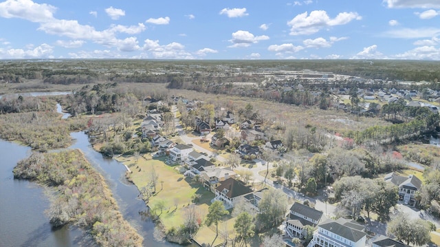 birds eye view of property featuring a residential view and a water view