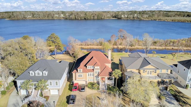 bird's eye view with a residential view and a water view