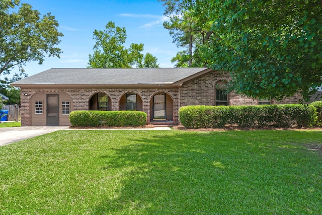 8116 Long Shadow Ln, North Charleston, SC 29406 - view of front of property with brick siding, a front lawn, and a shingled roof
