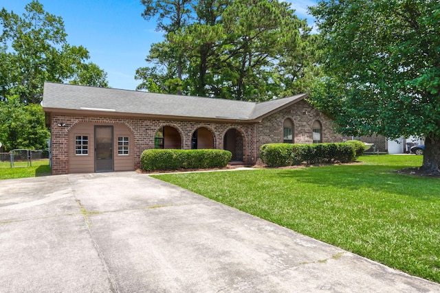 8116 Long Shadow Ln, North Charleston, SC 29406 - ranch-style house with brick siding, driveway, and a shingled roof