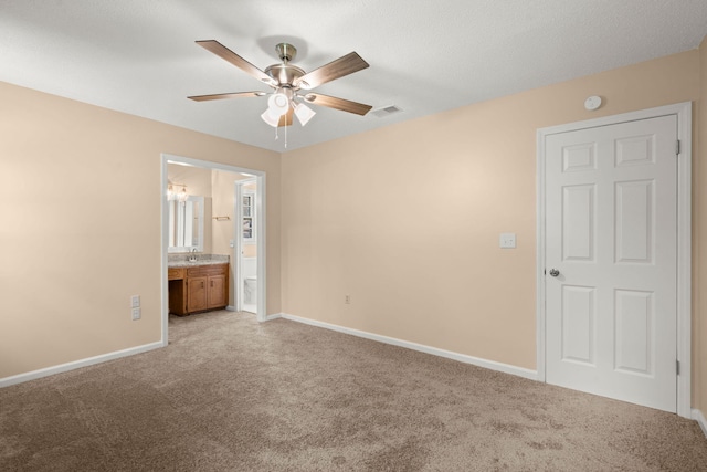 8116 Long Shadow Ln, North Charleston, SC 29406 - unfurnished bedroom featuring light colored carpet, ensuite bathroom, and a ceiling fan