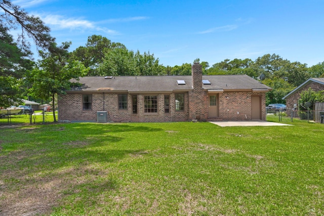 8116 Long Shadow Ln, North Charleston, SC 29406 - back of property featuring a patio, a chimney, and brick siding