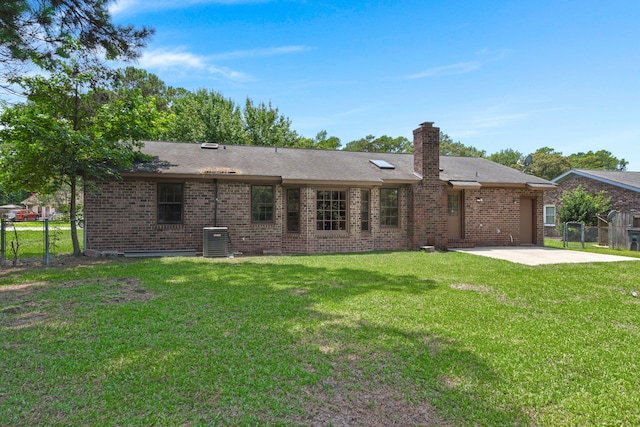 8116 Long Shadow Ln, North Charleston, SC 29406 - rear view of property featuring a patio, brick siding, and a chimney