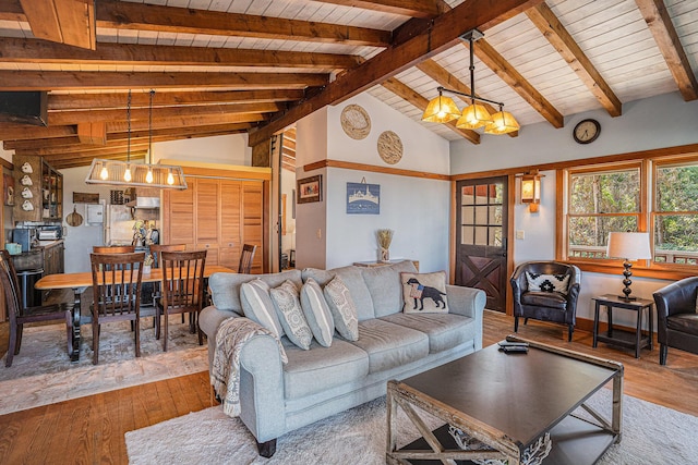 520 E Huron Ave, Folly Beach, SC 29439 - living room with hardwood / wood-style floors, a chandelier, and wooden ceiling