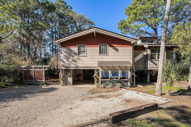 520 E Huron Ave, Folly Beach, SC 29439 - view of front of property featuring a carport and gravel driveway